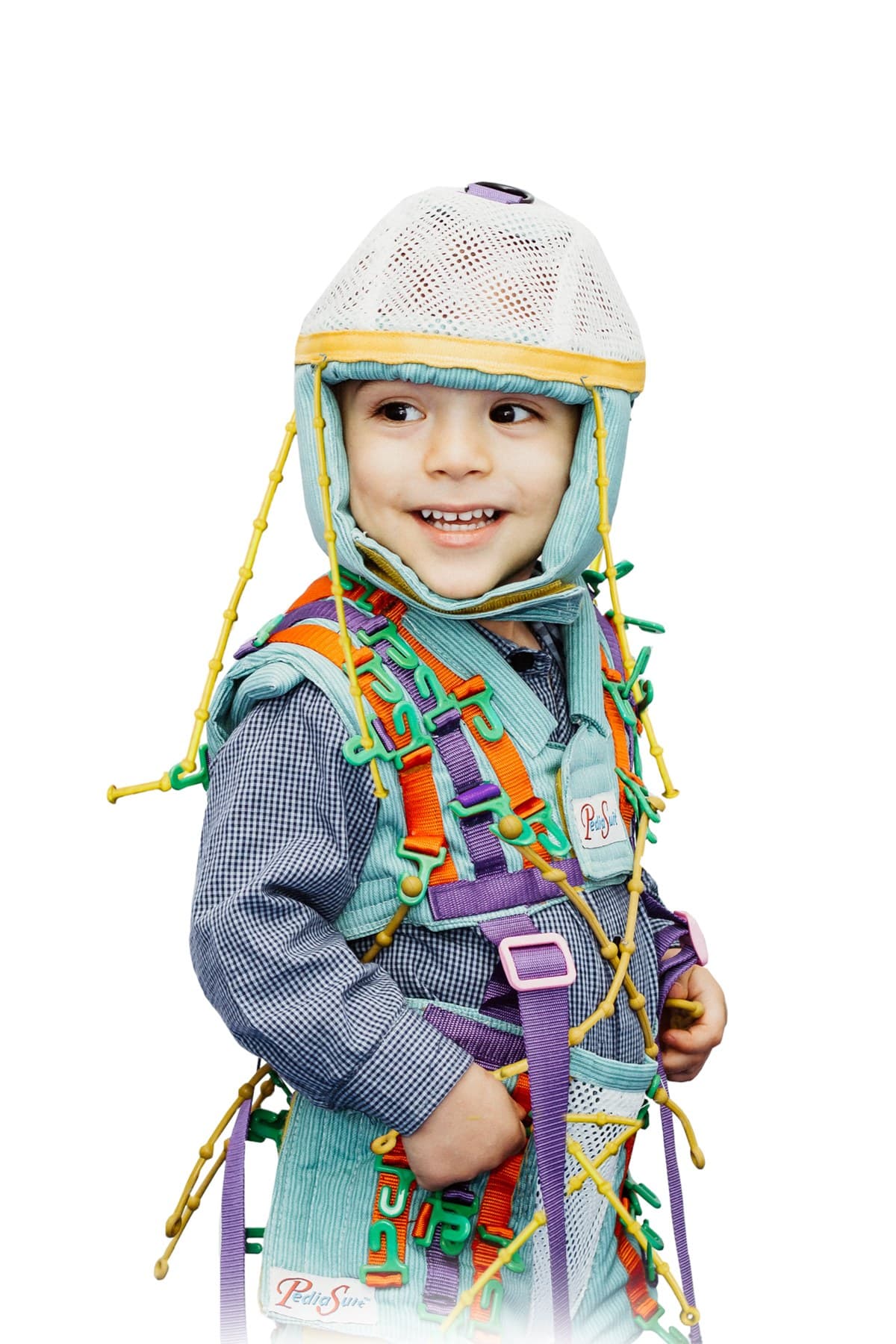 Smiling child wearing the PediaSuit therapeutic suit
